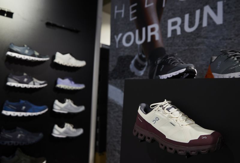 &copy; Reuters. Shoes by ON (Run on Clouds), a shoemaker backed by Swiss tennis player Roger Federer, are pictured in the Swiss Sport Style shop ahead of the Initial Public Offering (IPO), in Lausanne, Switzerland, September 14, 2021. REUTERS/Denis Balibouse