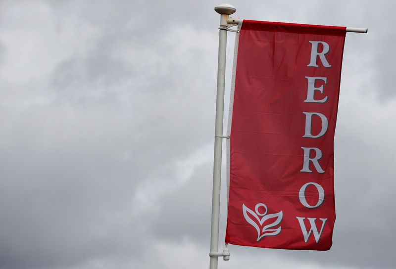 &copy; Reuters. FILE PHOTO: The company logo of construction company Redrow is pictured on a flag at a new housing development near Manchester northern England, April 7, 2016. REUTERS/Phil Noble