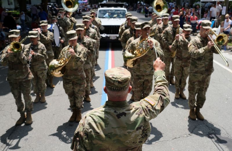 &copy; Reuters. FILE PHOTO: A Military bands perform during the 236th annual Military, Civic, and Firemen's Parade as part of 4th of July celebrations in Bristol, Rhode Island, U.S., July 5, 2021.  REUTERS/Quinn Glabicki
