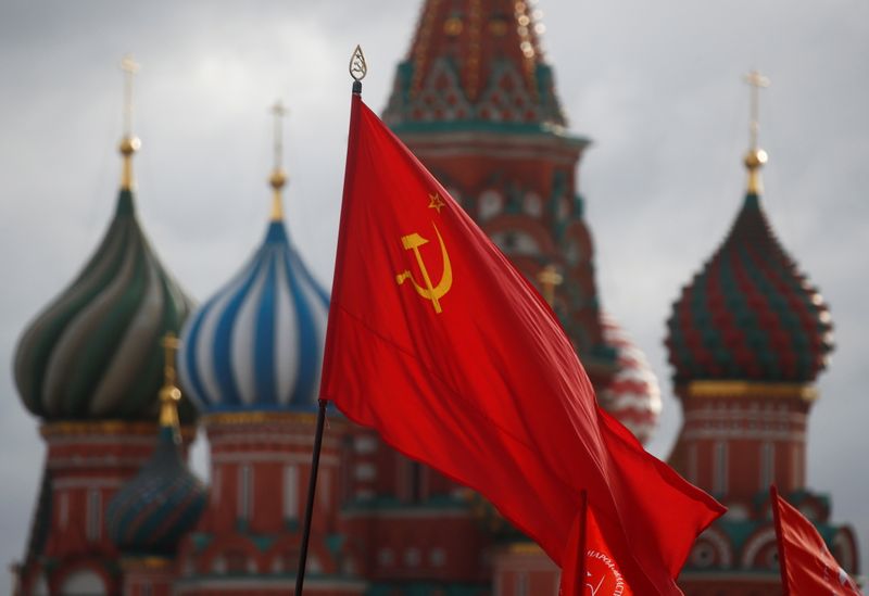 &copy; Reuters. A Soviet flag flies in front of St.Basil's Cathedral as supporters of the Russian Communist Party take part in a procession marking the anniversary of the 1917 Bolshevik Revolution, also known as the Great October Socialist Revolution, in Red Square in Mo