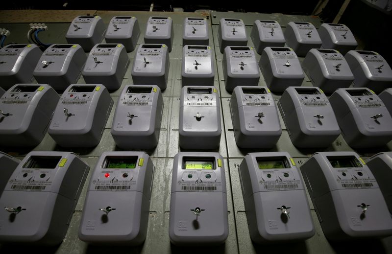 &copy; Reuters. FILE PHOTO: Electric meters of an apartment building are seen in Barcelona, Spain January 20, 2017. REUTERS/Albert Gea