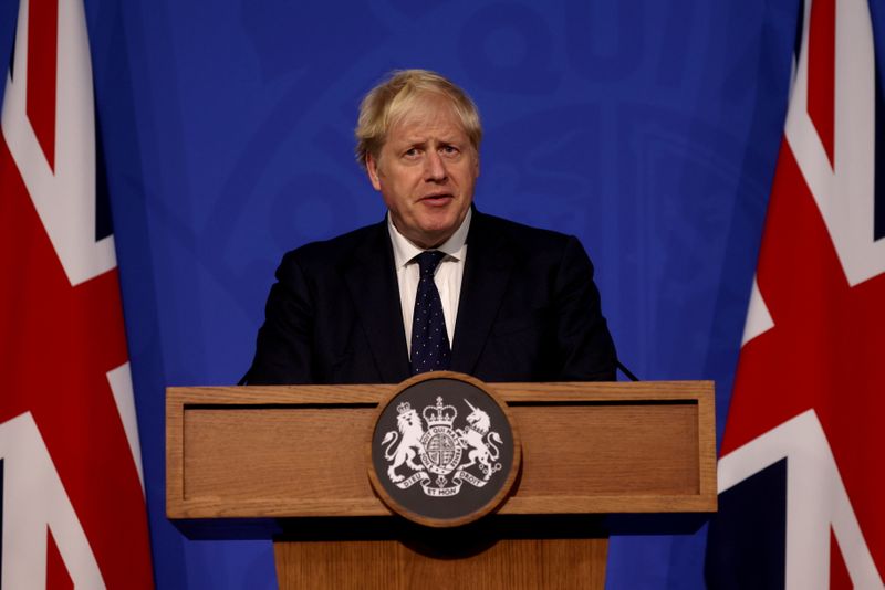 &copy; Reuters. رئيس الوزراء البريطاني بوريس جونسون يتحدث في مؤتمر صحفي في لندن يوم الثلاثاء. صورة لرويترز من ممثل وكالات أنباء.