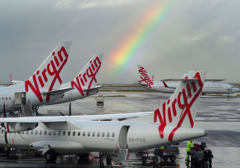 &copy; Reuters. FILE PHOTO: A rainbow from a passing rain shower sits over Virgin Australia aircraft at Sydney's Airport in Australia, August 5, 2016.  REUTERS/Jason Reed/File Photo