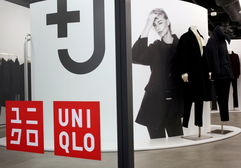 &copy; Reuters. FILE PHOTO: Clothes of the collaborative label +J from Uniqlo's new tie-up with German designer Jil Sander, are displayed at the retailer's press room in Tokyo, Japan November 6, 2020. REUTERS/Ritsuko Ando/File Photo