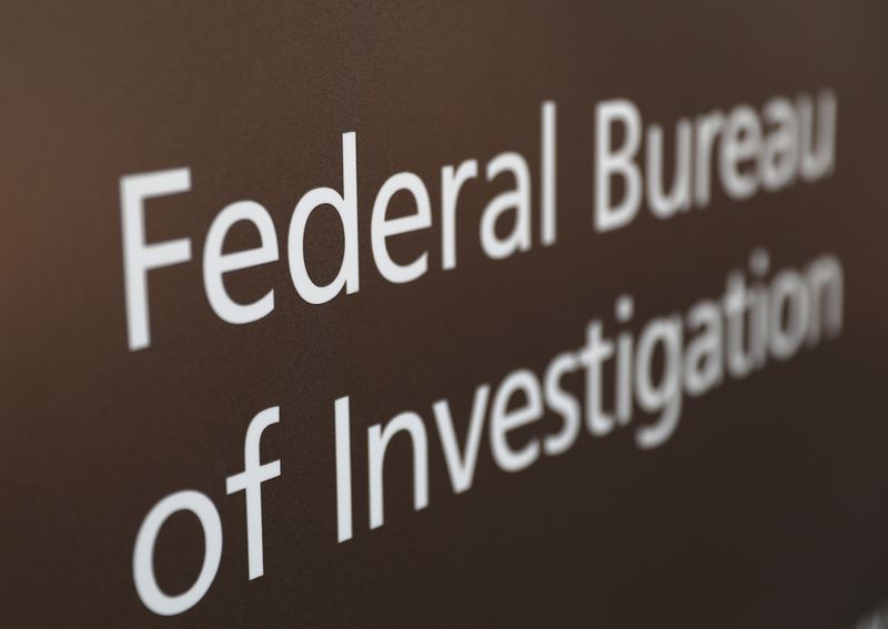 © Reuters. A sign of the Federal Bureau of Investigation is seen outside of the J. Edgar Hoover FBI Building in Washington, March 12, 2019. REUTERS/Leah Millis