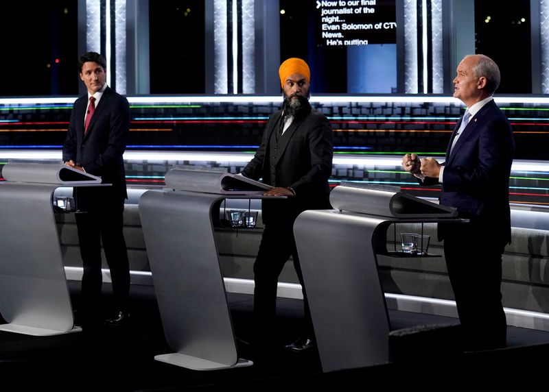 &copy; Reuters. FILE PHOTO: Liberal Leader Justin Trudeau, left to right, NDP Leader Jagmeet Singh, and Conservative Leader Erin O'Toole take part in the federal election English-language Leaders debate in Gatineau, Canada, September 9, 2021.  Adrian Wyld/Pool via REUTER
