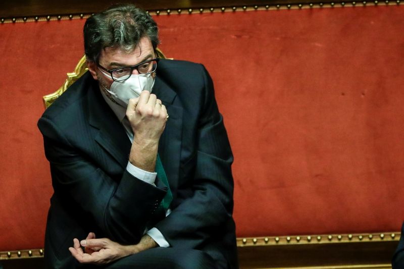 &copy; Reuters. FILE PHOTO: Italy's Minister for Economic Development Giancarlo Giorgetti attends a debate at the Senate ahead of a confidence vote for the government, in Rome, Italy, February 17, 2021. Andrew Medichini/Pool via REUTERS