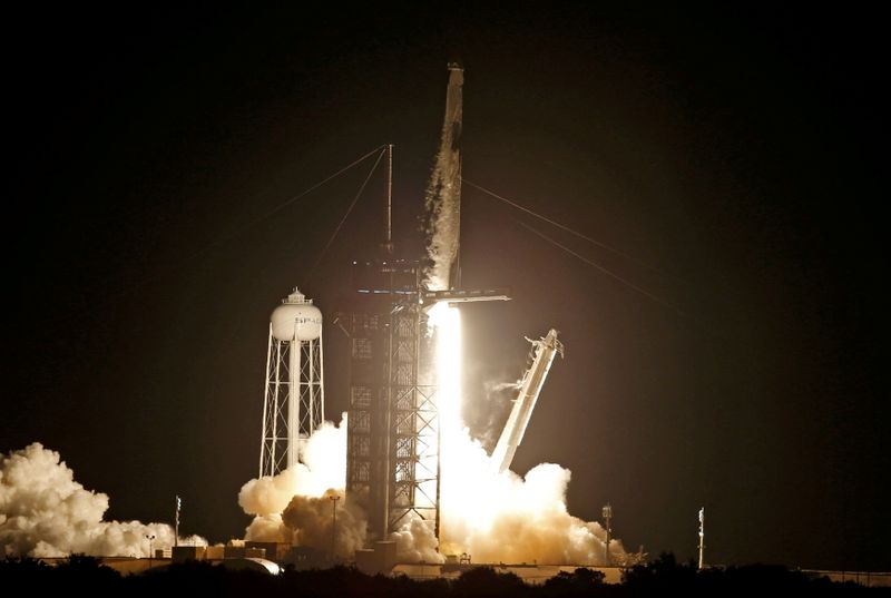 &copy; Reuters. FILE PHOTO: A SpaceX Falcon 9 rocket, with the Crew Dragon capsule, is launched carrying four astronauts on a NASA commercial crew mission at Kennedy Space Center in Cape Canaveral, Florida, September 15, 2021. REUTERS/Thom Baur