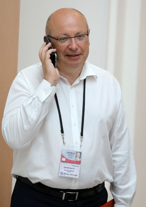 &copy; Reuters. FILE PHOTO: French Ambassador in charge of the G7 summit preparations Jean-Pierre Thebault speaks on his mobile phone while working in Biarritz, France August 25, 2019. Ludovic Marin/Pool via REUTERS