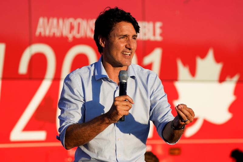 Trudeau warns against vote split in tight Canada election