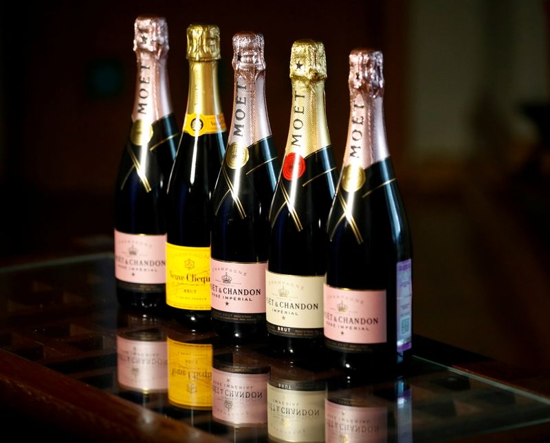 &copy; Reuters. FILE PHOTO: Bottles of Moet & Chandon and Veuve Clicquot French champagne are seen in this illustration picture taken July 5, 2021. REUTERS/Shamil Zhumatov/Illustration/File Photo/File Photo