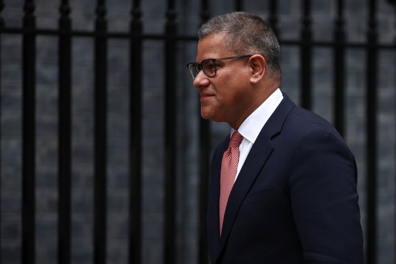 &copy; Reuters. Britain's Alok Sharma, president of this year's United Nations COP26 walks outside Downing Street in London, Britain, September 15, 2021. REUTERS/Hannah McKay/Files