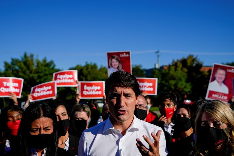 &copy; Reuters. Canada's Liberal Prime Minister Justin Trudeau speaks to reporters at an election campaign stop on the last campaign day before the election, in Montreal, Quebec, Canada September 19, 2021. REUTERS/Carlos Osorio