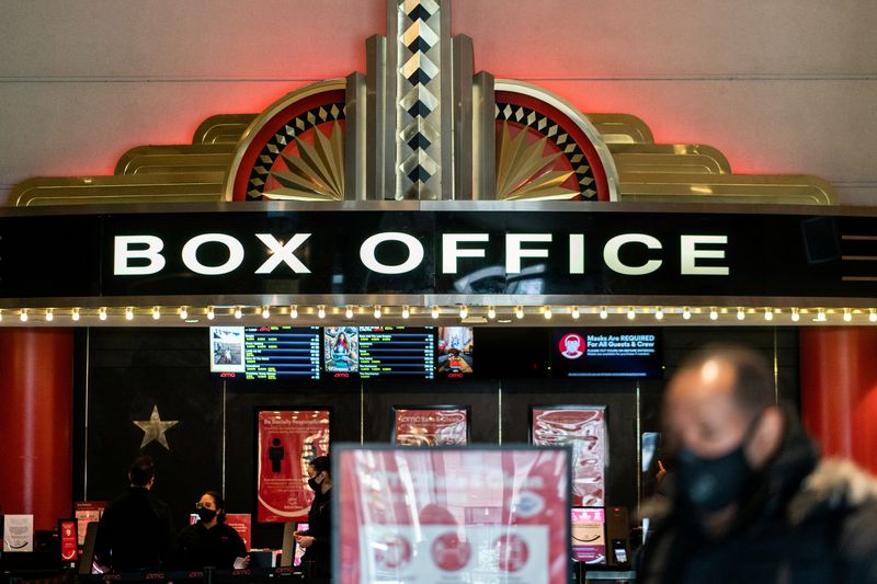&copy; Reuters. FILE PHOTO: A guest purchases a ticket in front of a box office at AMC movie theatre in Lincoln Square, amid the coronavirus disease (COVID-19) pandemic, in the Manhattan borough of New York City, New York, U.S., March 6, 2021. REUTERS/Jeenah Moon/File Ph