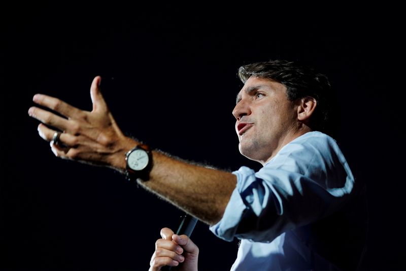 &copy; Reuters. FILE PHOTO: Canada's Liberal Prime Minister Justin Trudeau speaks during an election campaign stop in Peterborough, Ontario, Canada September 18, 2021. REUTERS/Carlos Osorio