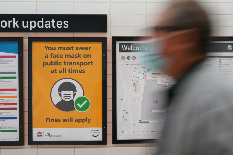 &copy; Reuters. A sign at Central Station notes the implementation of new public health regulations from the state of New South Wales, as the city grapples with an outbreak of the coronavirus disease (COVID-19) in Sydney, Australia, June 23, 2021.  REUTERS/Loren Elliott/