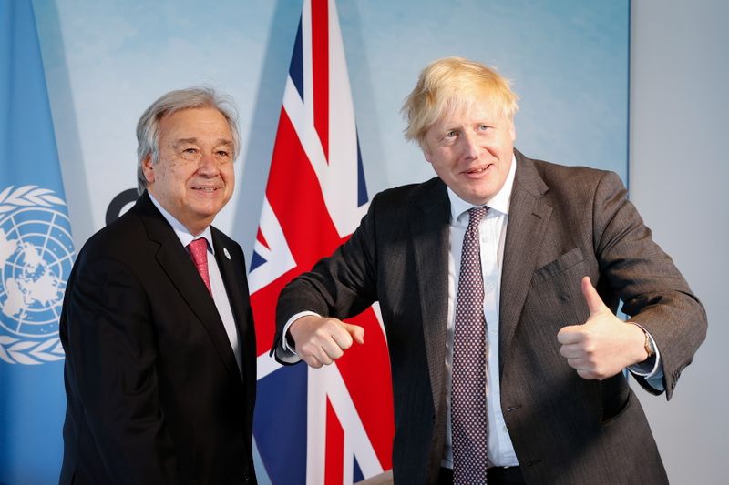 &copy; Reuters. FILE PHOTO: Britain's Prime Minister Boris Johnson greets U.N. Secretary-General Antonio Guterres before a bilateral meeting, during G7 summit in Carbis Bay, Cornwall, Britain, June 12, 2021. Adrian Dennis/Pool via REUTERS