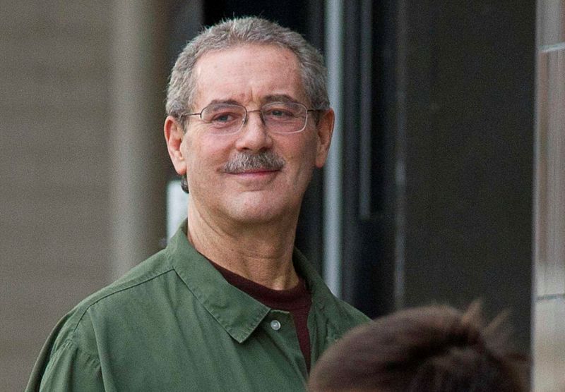 &copy; Reuters. FILE PHOTO: Allen Stanford smiles as he waits to enter the Federal Courthouse  in Houston March 6, 2012. REUTERS/Richard Carson/File Photo