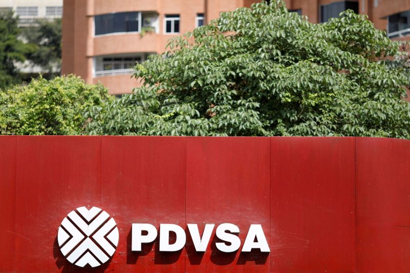 &copy; Reuters. FILE PHOTO: he corporate logo of the state oil company PDVSA is seen at a gas station in Caracas, Venezuela November 16, 2017. REUTERS/Marco Bello/File Photo