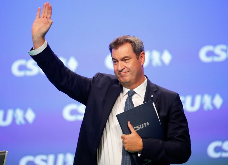 &copy; Reuters. FILE PHOTO: Bavarian State Prime Minister and CSU leader Markus Soeder waves to the delegates of a two-day party convention in Nuremberg, Germany, September 10, 2021.   REUTERS/Wolfgang Rattay