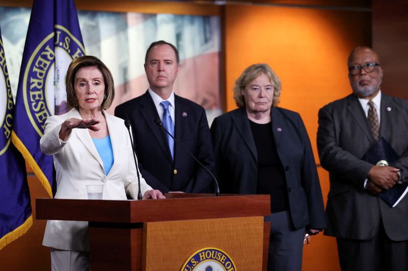 &copy; Reuters. FILE PHOTO: U.S. House Speaker Nancy Pelosi (D-CA) is flanked by Reps.' Adam Schiff (D-CA), Zoe Lofgren (D-CA) and House Homeland Security Committee Chair Benny Thompson (D-MS) as she discusses the formation of a select committee to investigate the Januar
