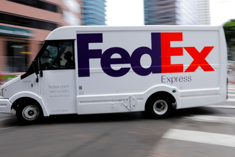 &copy; Reuters. FILE PHOTO: A FedEx truck is driven through downtown in Los Angeles, California, U.S., July 22, 2019. REUTERS/Mike Blake/File Photo