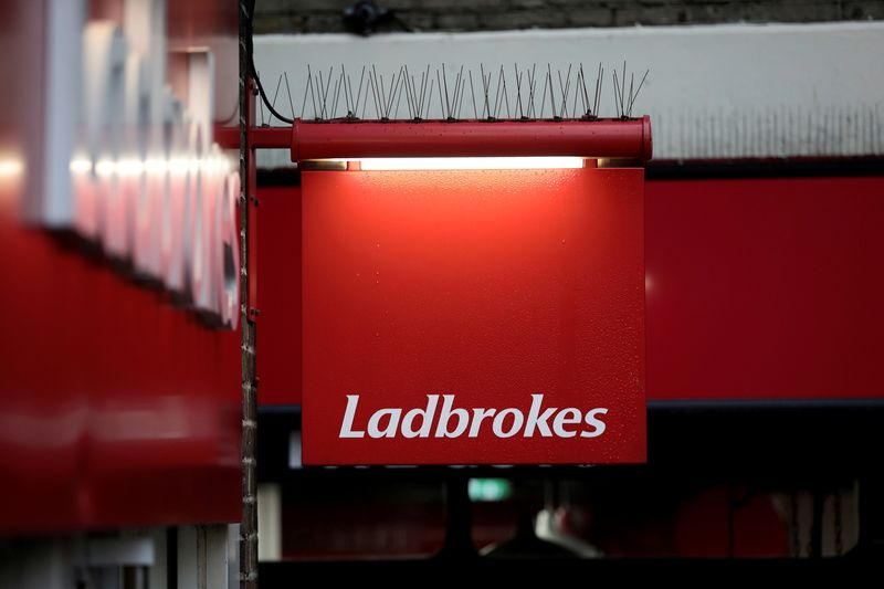 &copy; Reuters. FILE PHOTO: A sign hangs outside a branch of Ladbrokes in London, Britain December 22, 2017. REUTERS/Simon Dawson