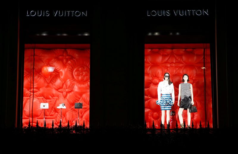 &copy; Reuters. FILE PHOTO: Louis Vuitton logo brad is seen outside a Louis Vuitton store in Paris, France, January 27, 2020. REUTERS/Gonzalo Fuentes/File Photo