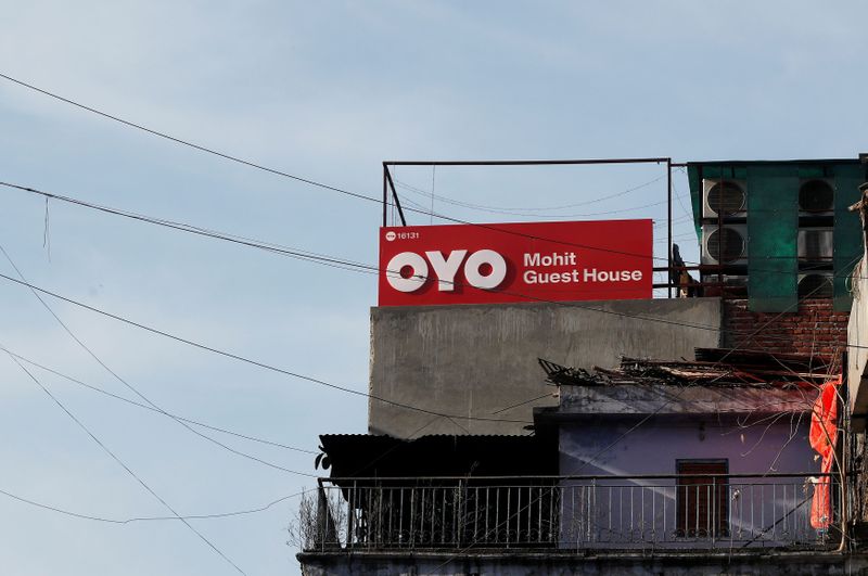 &copy; Reuters. FILE PHOTO: The logo of OYO, India's largest and fastest-growing hotel chain, is seen installed on a hotel building in New Delhi, India, April 3, 2019. REUTERS/Adnan Abidi/File Photo
