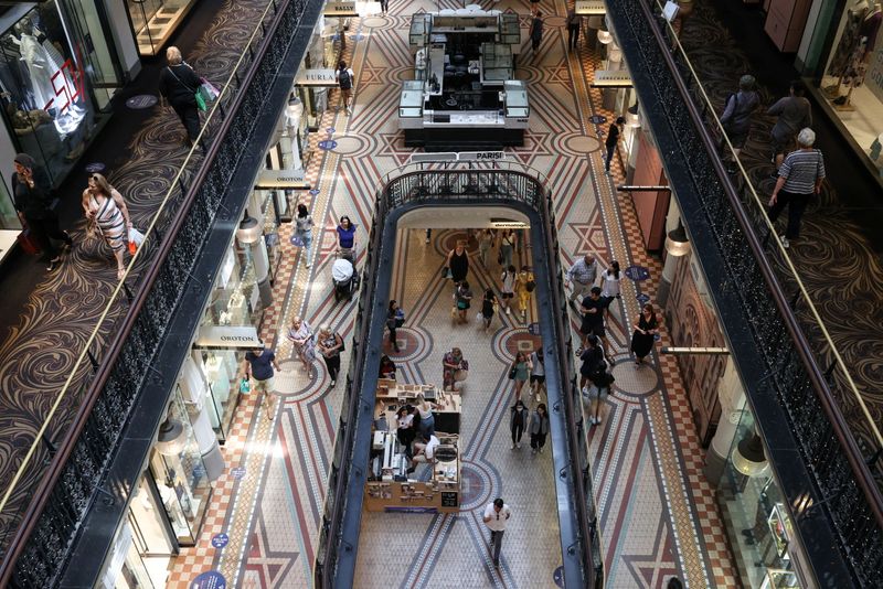 &copy; Reuters. FILE PHOTO: Holiday shoppers are seen in a mall in the city centre of Sydney, Australia, December 17, 2020.  REUTERS/Loren Elliott