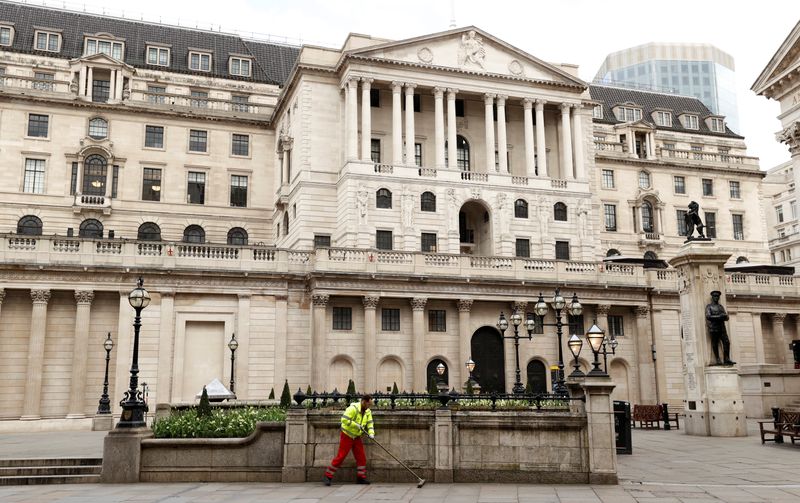 &copy; Reuters.  A street sweeper cleans outside the Bank of England as the spread of the coronavirus disease (COVID-19) continues, London, Britain, March 31, 2020. REUTERS/John Sibley