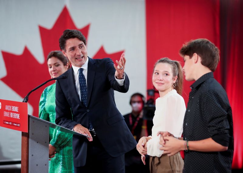 &copy; Reuters. FILE PHOTO: Canada's Liberal Prime Minister Justin Trudeau, accompanied by his wife Sophie Gregoire thanks their children Ella-Grace and Xavier during the Liberal election night party in Montreal, Quebec, Canada, September 21, 2021. REUTERS/Christinne Mus
