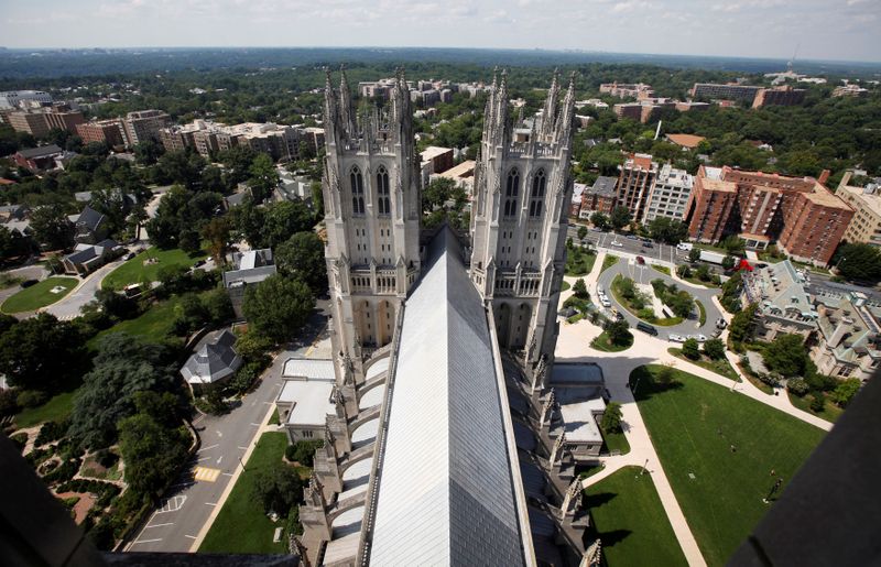 &copy; Reuters. FILE PHOTO: The west front of Washington's National Cathedral is photographed from the damaged main tower after an earthquake August 24, 2011. REUTERS/Jason Reed