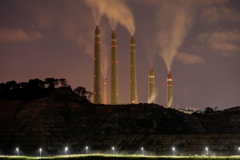 &copy; Reuters. FILE PHOTO: Smoke and steam billows from the coal-fired power plant owned by Indonesia Power, next to an area for Java 9 and 10 Coal-Fired Steam Power Plant Project in Suralaya, Banten province, Indonesia, July 11, 2020. Picture taken July 11, 2020. REUTE