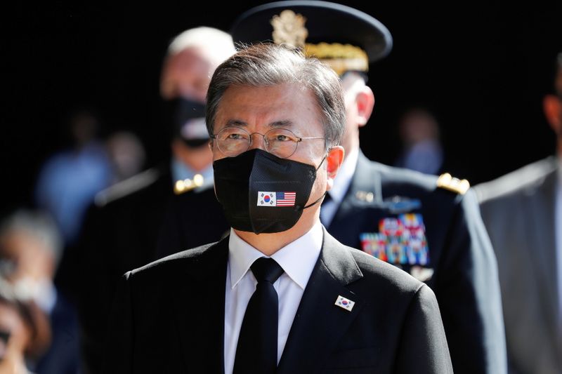 &copy; Reuters. FILE PHOTO: South Korea's President Moon Jae-in attends the first joint repatriation ceremony for Korean War remains at Joint Base Pearl Harbor-Hickam near Honolulu, Hawaii, U.S. September 22, 2021.  REUTERS/Marco Garcia/File Photo