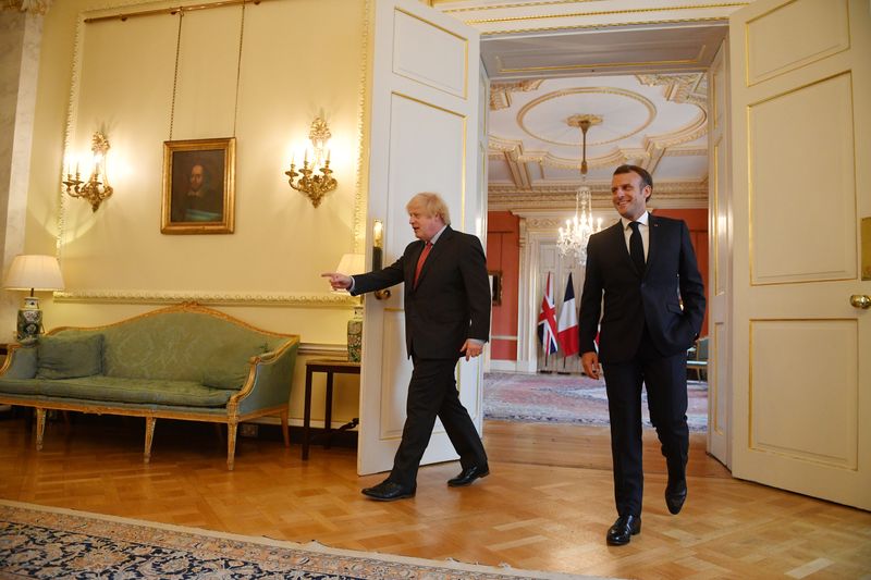 &copy; Reuters. British Prime Minister Boris Johnson and French President Emmanuel Macron walk together at Downing Street in London, Britain, June 18, 2020. Justin Tallis/Pool via REUTERS