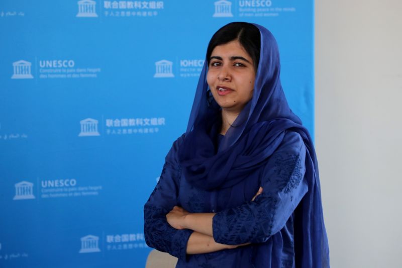 &copy; Reuters. FILE PHOTO: Nobel Peace Prize laureate Malala Yousafzai poses for photographs during the Education and Development G7 Ministers Summit in Paris, France, July 5, 2019. Christophe Petit Tesson/Pool via REUTERS/File Photo