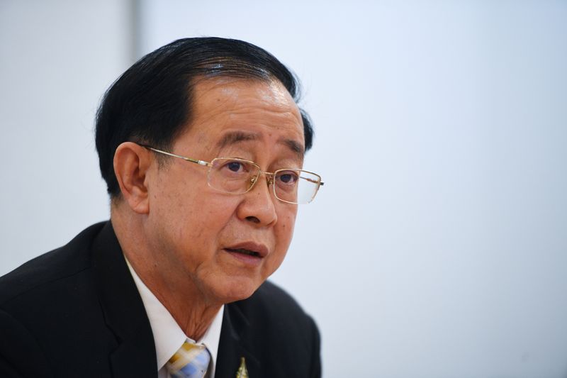 &copy; Reuters. FILE PHOTO: Thai finance minister Arkhom Termpittayapaisith speaks during an interview with Reuters in Bangkok, Thailand January 21, 2021. REUTERS/Chalinee Thirasupa/File Photo
