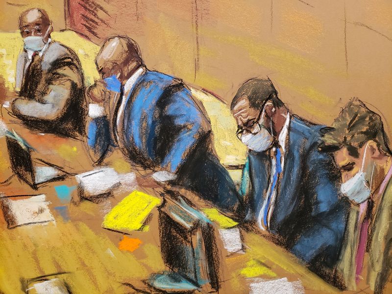 &copy; Reuters. R. Kelly sits with his lawyers Deveraux Cannick, Calvin Scholar and Thomas Farinella as the jury deliberate in Kelly's sex abuse trial at Brooklyn's Federal District Court in a courtroom sketch in New York, U.S., September 27, 2021. REUTERS/Jane Rosenberg