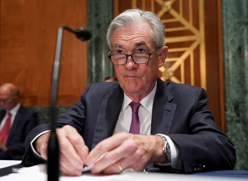 © Reuters. FILE PHOTO: Federal Reserve Chairman Jerome Powell takes his seat to testify before a Senate Banking, Housing and Urban Affairs Committee hearing on “The Semiannual Monetary Policy Report to the Congress” on Capitol Hill in Washington, U.S., July 15, 2021. REUTERS/Kevin Lamarque/File Photo