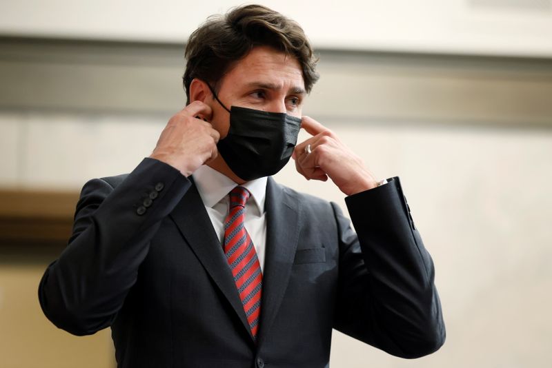 &copy; Reuters. FILE PHOTO: Canada's Prime Minister Justin Trudeau holds a press conference, as he tells reporters that the two Canadian citizens who were detained by Beijing have left Chinese airspace and will arrive back in Canada early on Saturday, in Ottawa, Ontario,