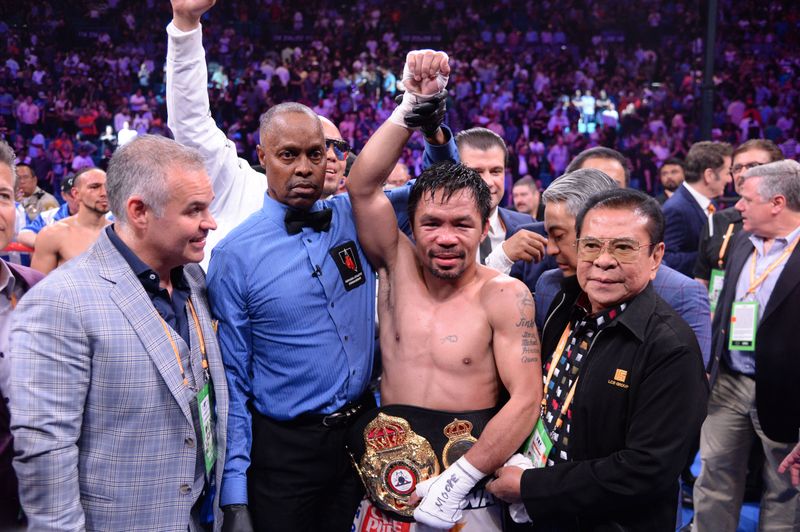 &copy; Reuters. FILE PHOTO: Jul 20, 2019; Las Vegas, NV, USA; Manny Pacquiao (white trunks) celebrates after defeating Keith Thurman (not pictured) in their WBA welterweight championship bout at MGM Grand Garden Arena. Pacquiao won via split decision. Mandatory Credit: J