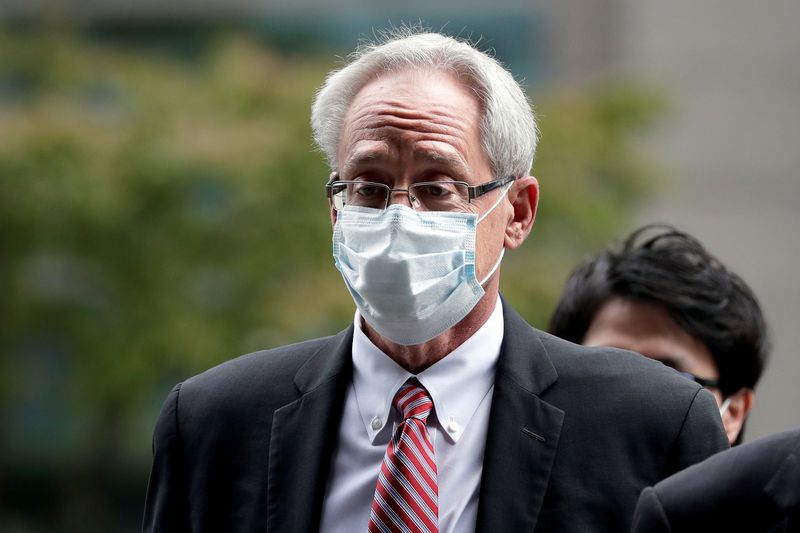 &copy; Reuters. Greg Kelly, former representative director of Nissan Motor Co., arrives for the first trial hearing at the Tokyo District Court in Tokyo, Japan, September 15, 2020.   Kiyoshi Ota/Pool via REUTERS/Files