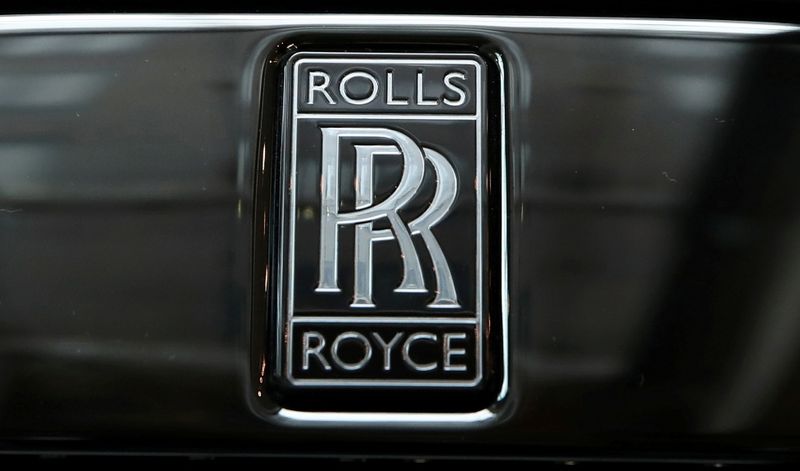 &copy; Reuters. FILE PHOTO: The badge of a Rolls-Royce Black Badge Dawn car is seen at a dealership in London, Britain, October 27, 2020.  REUTERS/Peter Cziborra/File Photo