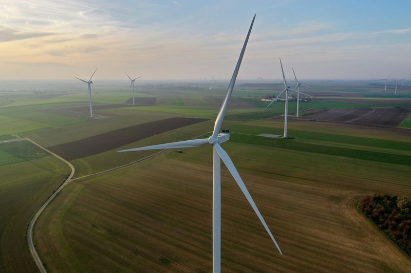 &copy; Reuters. FILE PHOTO: An aerial view shows power-generating windmill turbines in a wind farm in Graincourt-les-havrincourt, France, November 7, 2020. Picture taken with a drone.  REUTERS/Pascal Rossignol/File Photo