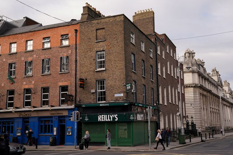&copy; Reuters. FILE PHOTO: A shuttered pub called Reilly's is seen closed due to Government restrictions around coronavirus, amid the coronavirus disease (COVID-19) pandemic, in Dublin, Ireland, September 3, 2020.  REUTERS/Clodagh Kilcoyne