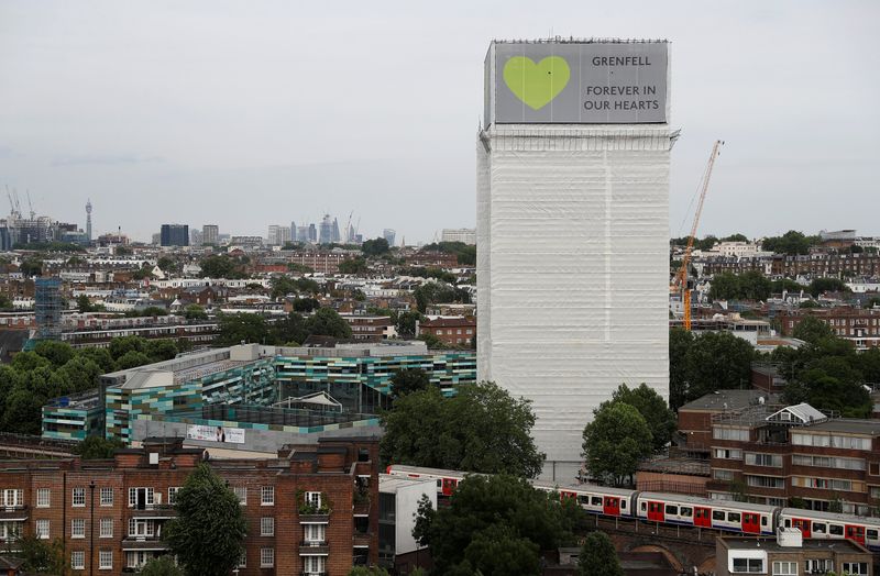 &copy; Reuters. Grenfell Tower is seen shrouded by scaffolding and covers one year after the tower fire in London, Britain June 13, 2018. REUTERS/Peter Nicholls