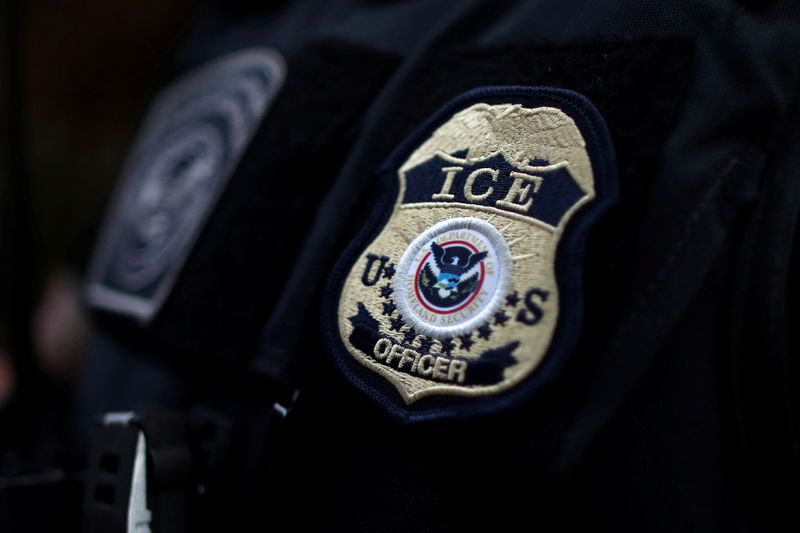 &copy; Reuters. FILE PHOTO: The badge of ICE Field Office Director, Enforcement and Removal Operations, David Marin and U.S. Immigration and Customs Enforcement's (ICE) Fugitive Operations team search for a Mexican national at a home in Hawthorne, California, U.S., March
