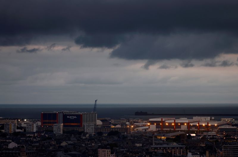 &copy; Reuters. A general view shows the Naval Group site, the port and the skyline of the shipbuilding town of Cherbourg-en-Contentin, France, September 23, 2021.  REUTERS/Stephane Mahe