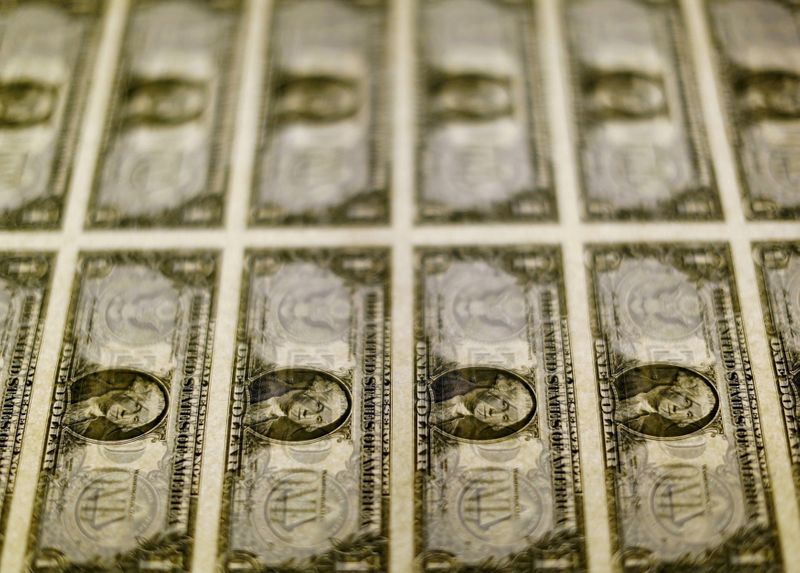 &copy; Reuters. FILE PHOTO: U.S. dollar bills are seen on a light table at the Bureau of Engraving and Printing in Washington, November 14, 2014. REUTERS/Gary Cameron/File Photo/File Photo